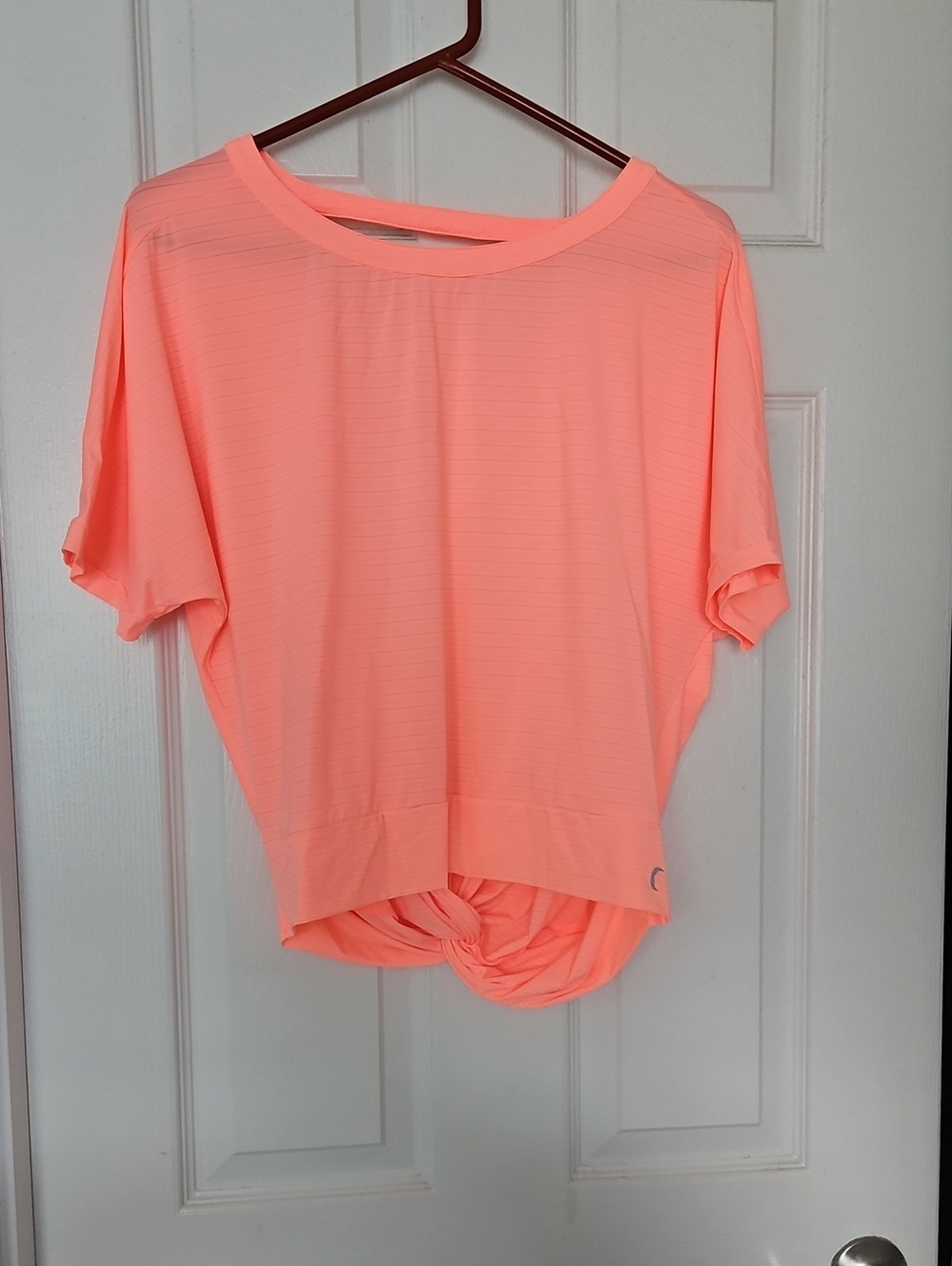 Women’s Short Sleeve Twist-Back Tee in Neon Coral